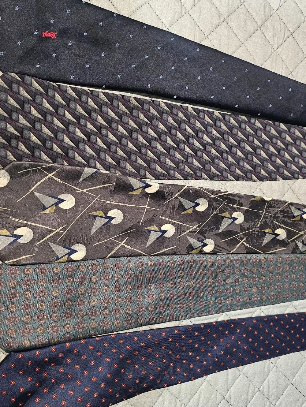 Vintage Men's Assorted Patterned Ties in Navy, Gray, and Blue